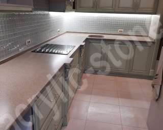 Фото Угловая кухонная столешница  из искусственного камня с интегрированной мойкой Grandex
