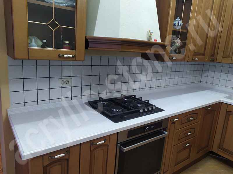 Фото Угловая радиусная столешница для кухни из искусственного камня SAMSUNG STARON с интегрированной мойкой